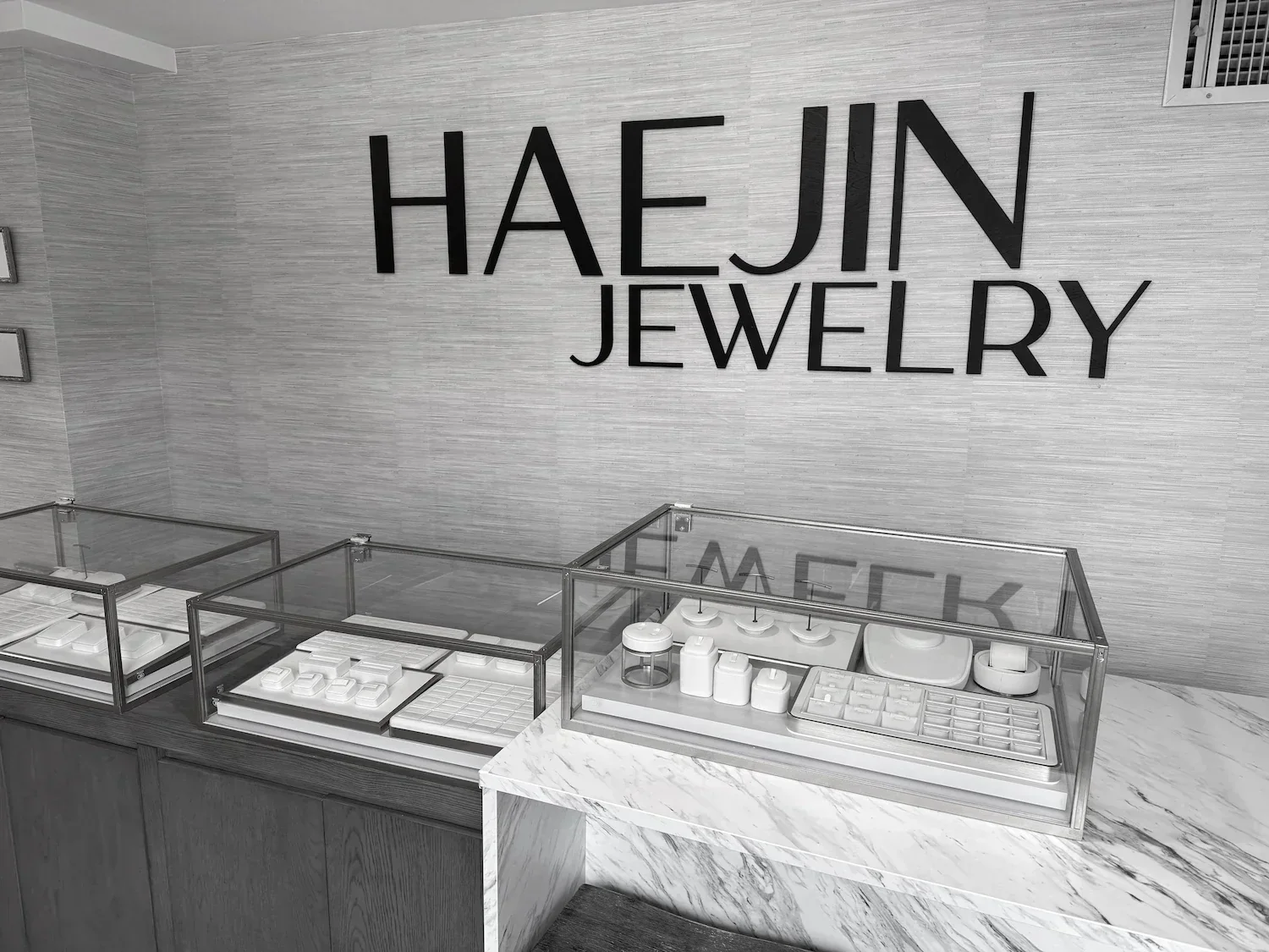 Haejin Jewelry studio interior in Williamsburg Brooklyn with marble display cases