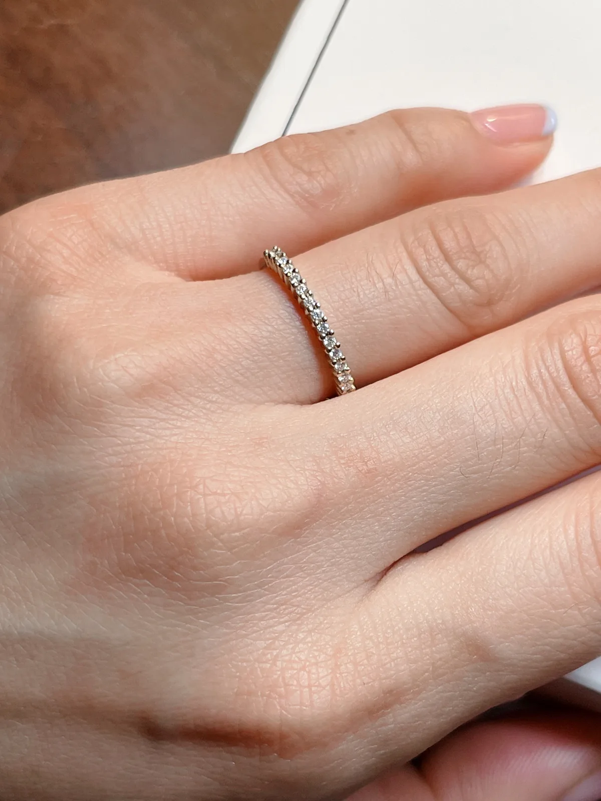 Thin 1.5mm micro-pave diamond wedding band on hand in white gold, minimalist style, Haejin Jewelry Brooklyn