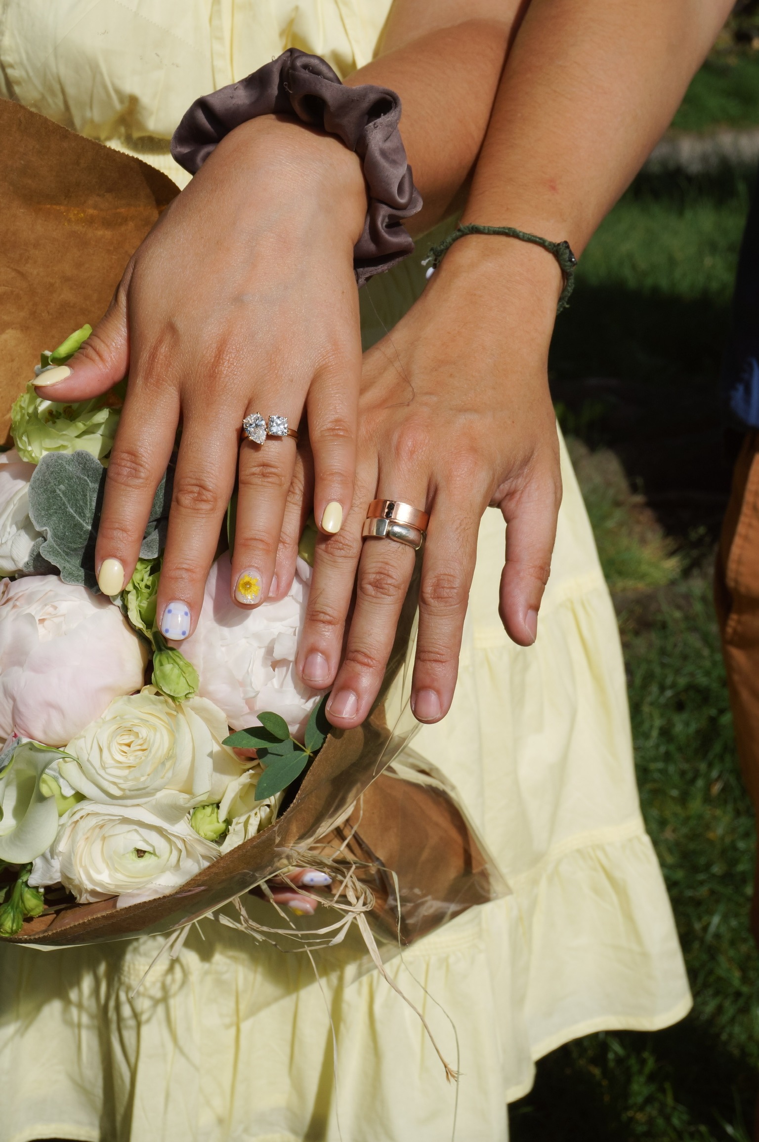 Both custom engagement rings: Daye's toi et moi and Yorick's rose gold band, designed together at Haejin Jewelry Williamsburg Brooklyn