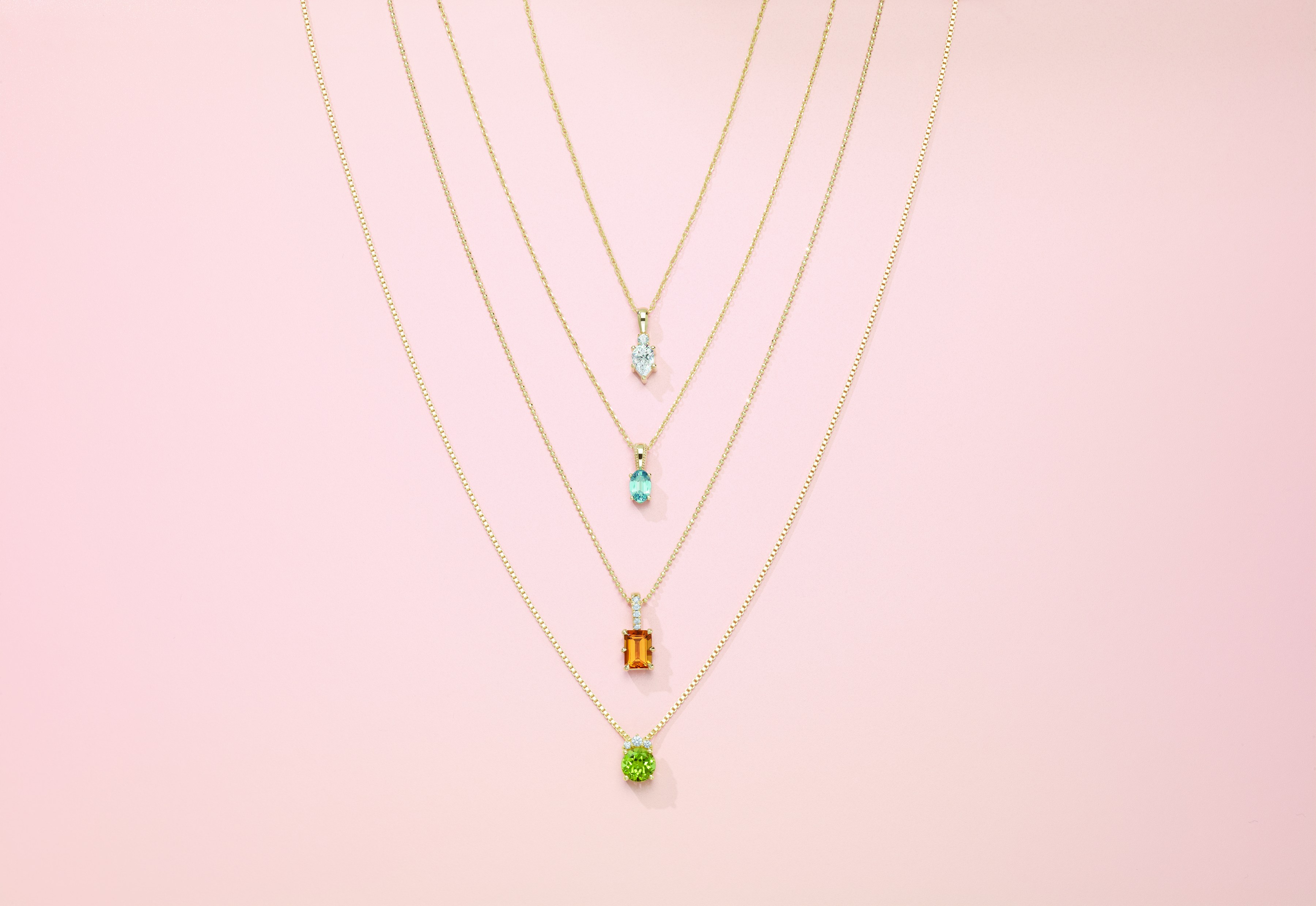 Gemstone pendant necklaces in 14K gold with diamond aquamarine citrine and peridot at Haejin Jewelry Brooklyn