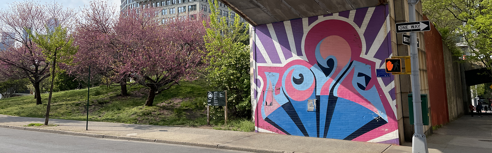Explore DUMBO love mural in Brooklyn, one of the most romantic and photogenic neighborhoods for a marriage proposal in New York City