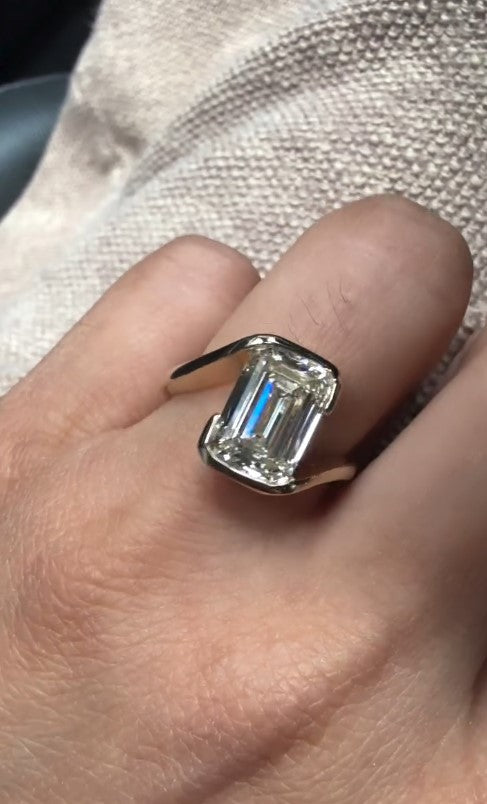 Emerald-cut lab-grown diamond engagement ring in a full bezel setting, custom designed at Haejin Jewelry in Williamsburg Brooklyn